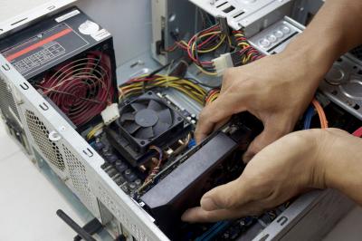 ./pages/portfolio/img/vecteezy_a-close-up-of-a-technician-replacing-a-graphics-card_1254184.jpg